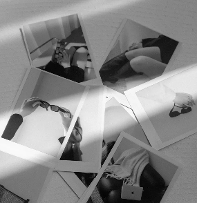 Sophisticated detail shot of a brand photoshoot on polaroids in black and white.